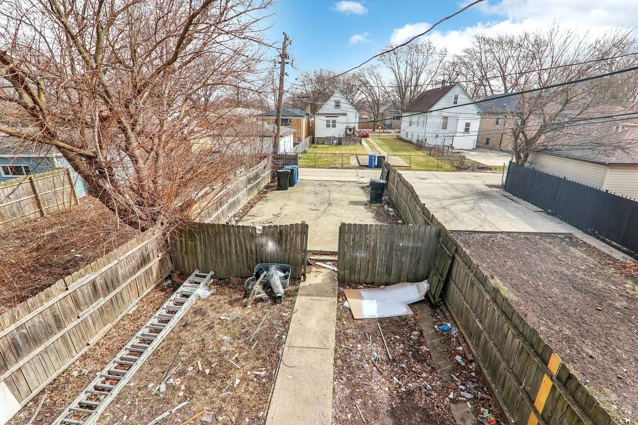 8807 S Lowe Ave - Photo 7 of 9