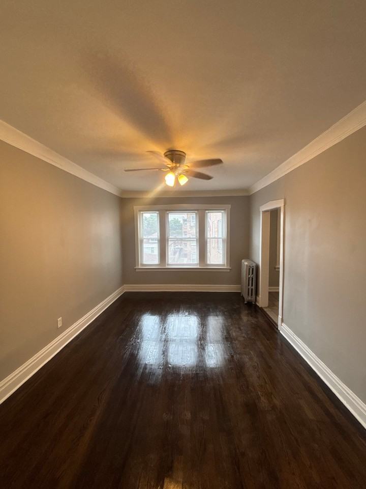 6055 S Troy St #6055-2 - Photo 5 of 7
