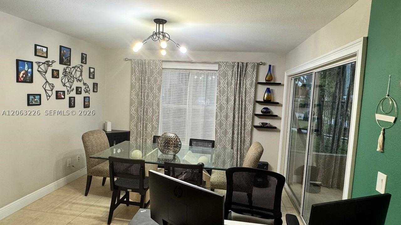 1705 Palm Cove Blvd #1-105 - Photo 3 of 22