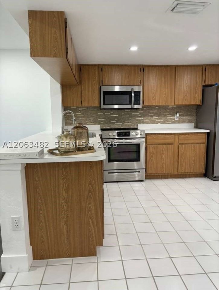 1005 Palm Beach Trace Dr #1005