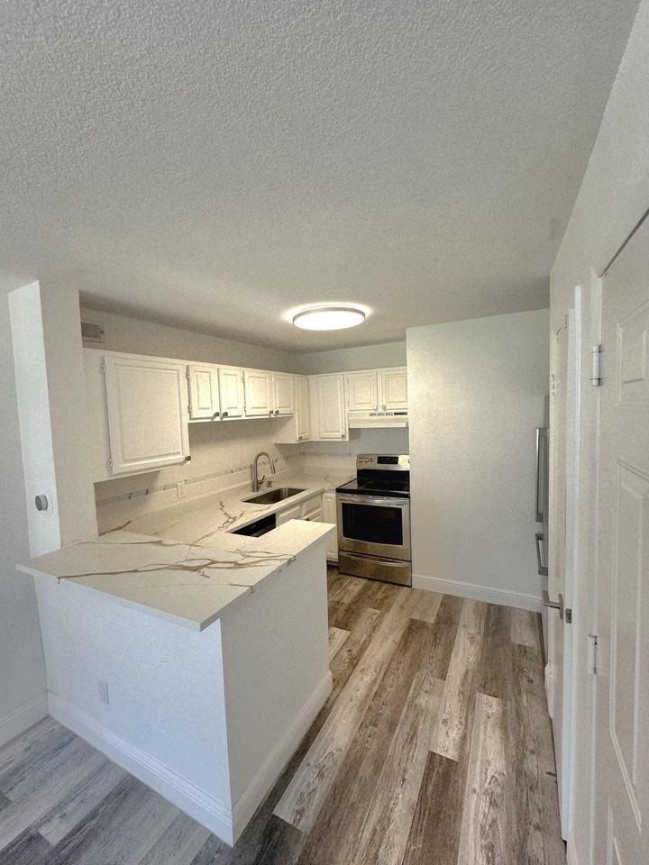 1760 Palm Cove Blvd #106 - Photo 3 of 23