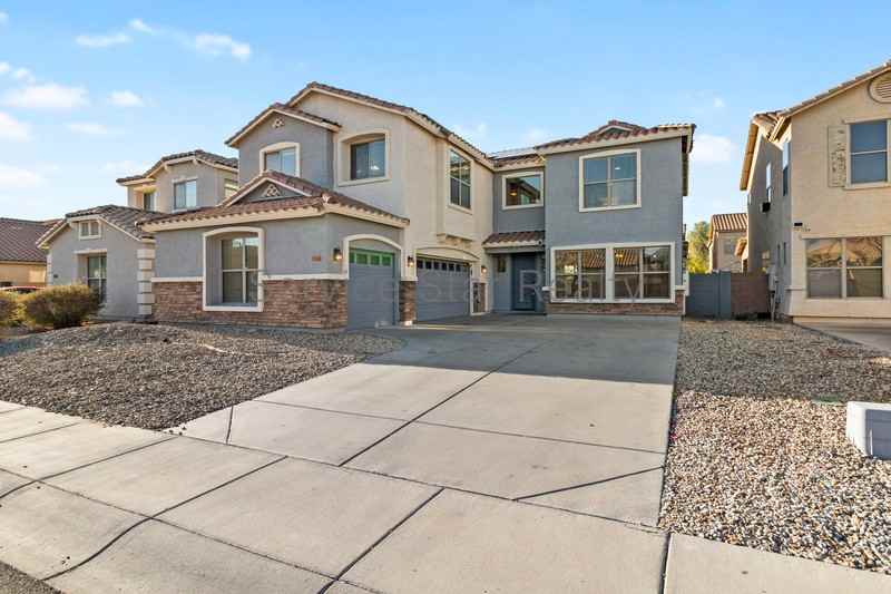 10122 W Albeniz Pl - Photo 2 of 33