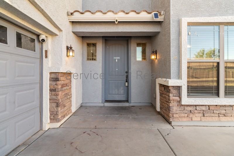 10122 W Albeniz Pl - Photo 3 of 33
