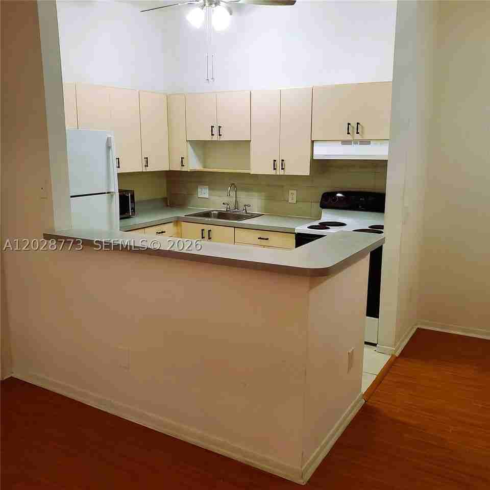 9729 Hammocks Blvd #206E - Photo 3 of 14