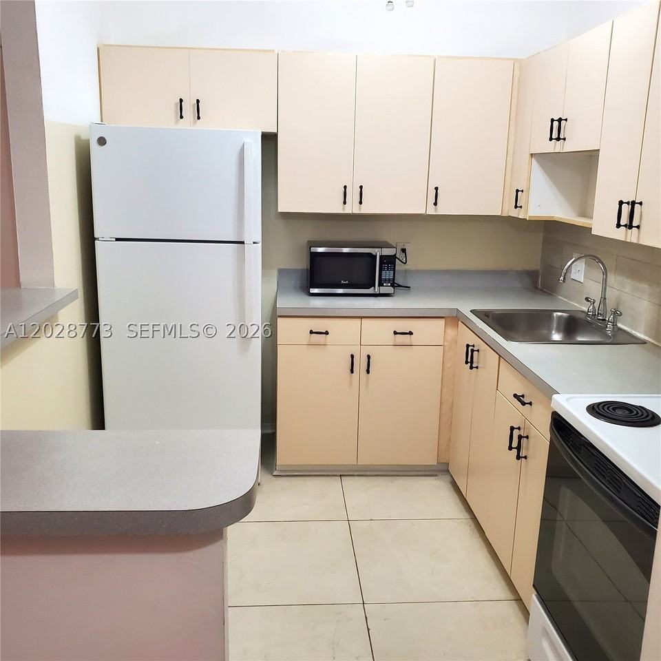 9729 Hammocks Blvd #206E - Photo 4 of 14