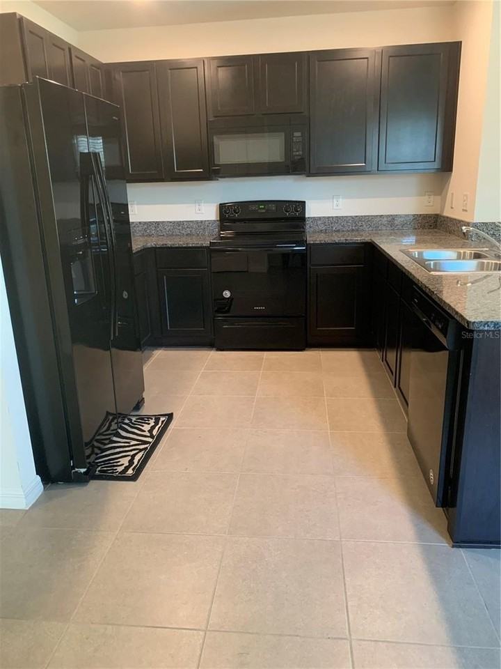 10977 Carlton Fields Dr - Photo 4 of 10