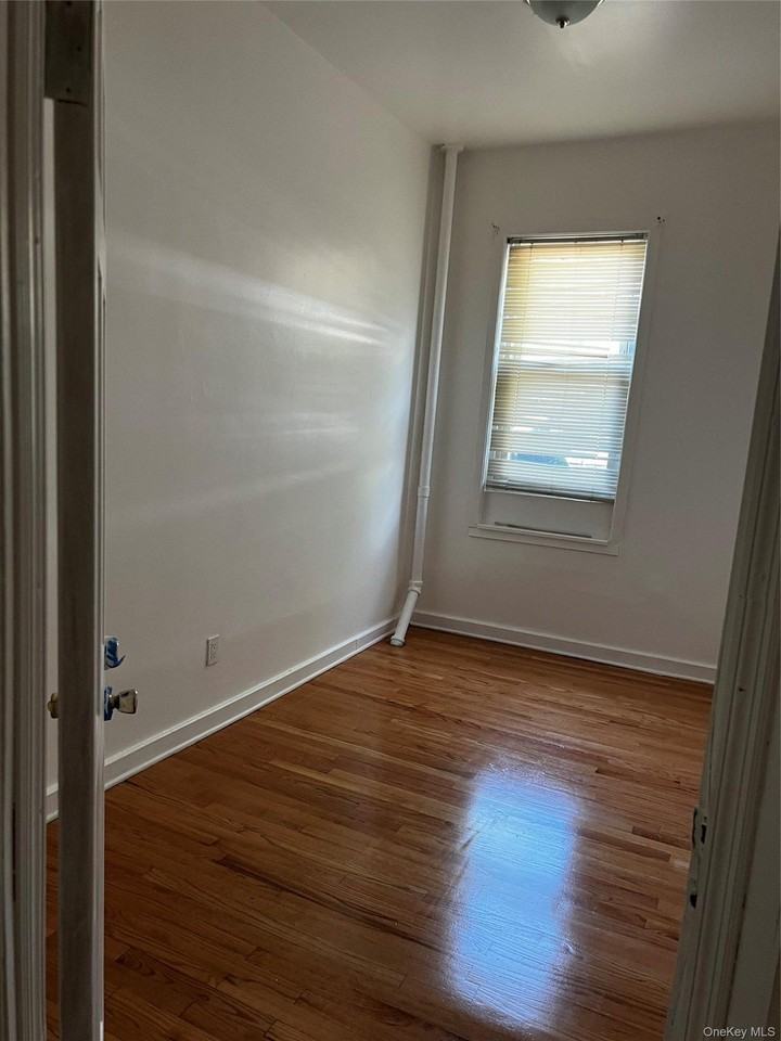 847 E 220th St - Photo 2 of 8