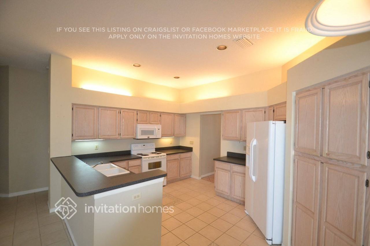 10316 Rainbridge Dr - Photo 4 of 9