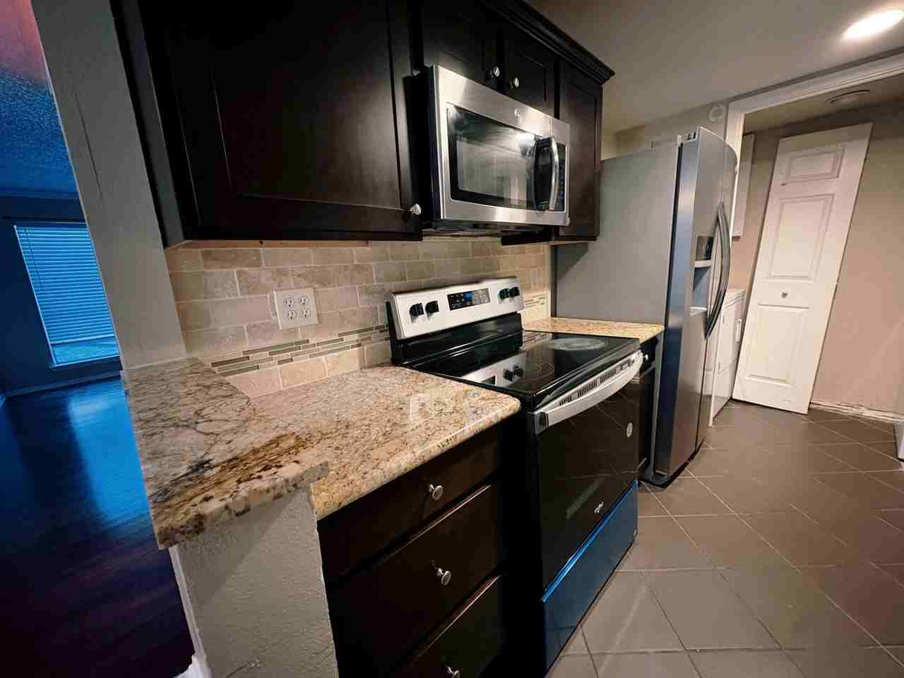 919 S Weatherred Dr #135 - Photo 6 of 10