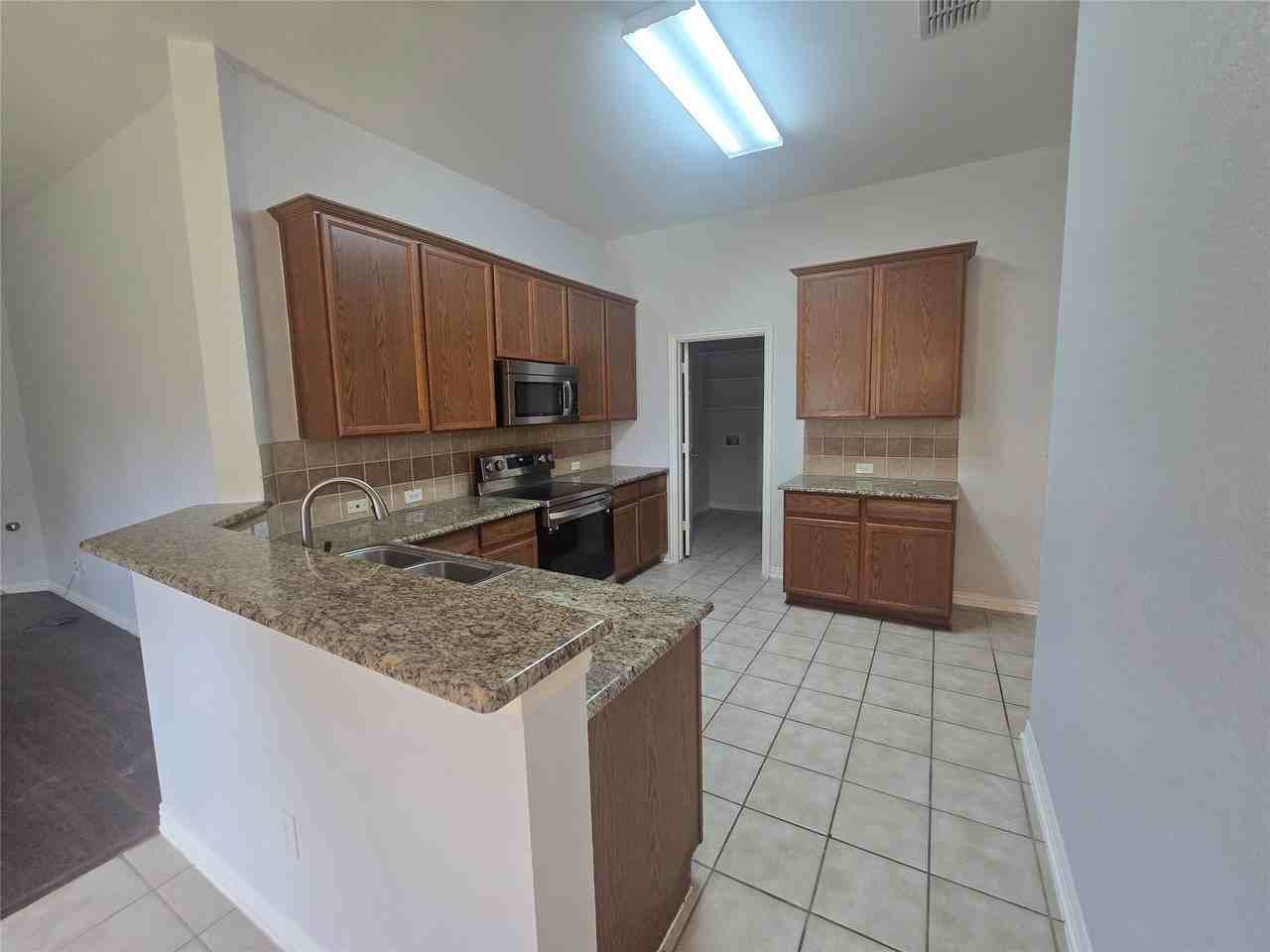 7617 Uvalde Way - Photo 4 of 20