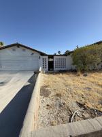 featured image of 897 E Racquet Club Rd