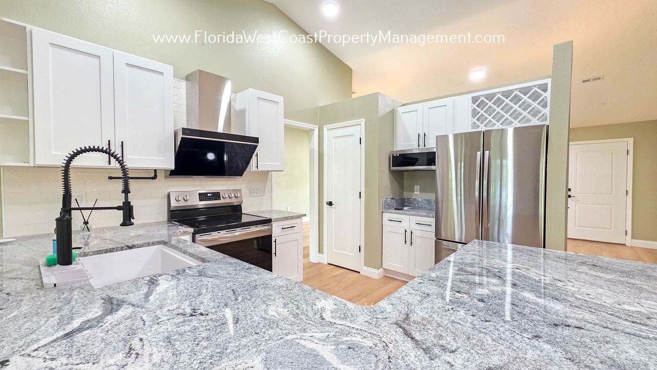 4667 Hamlets Grove Dr - Photo 2 of 50