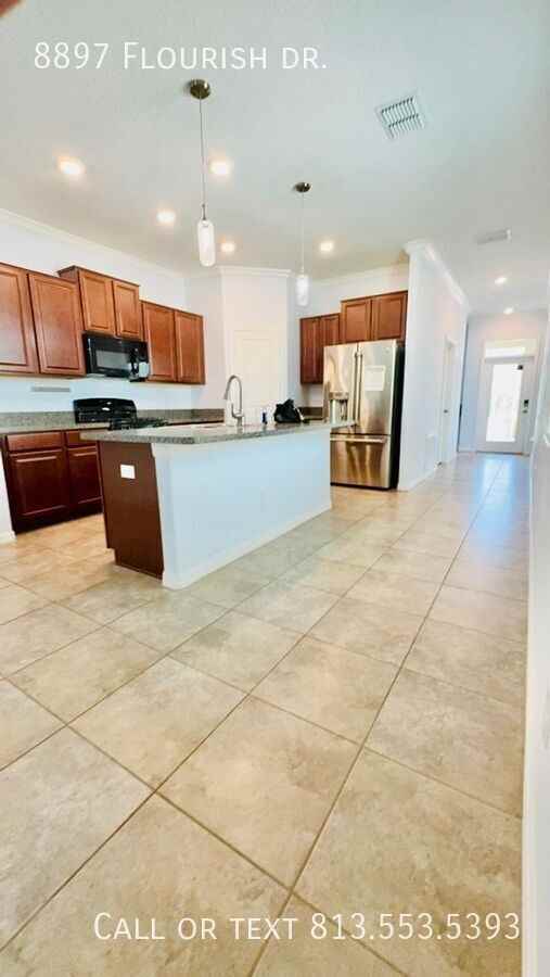 8897 Flourish Dr - Photo 4 of 33