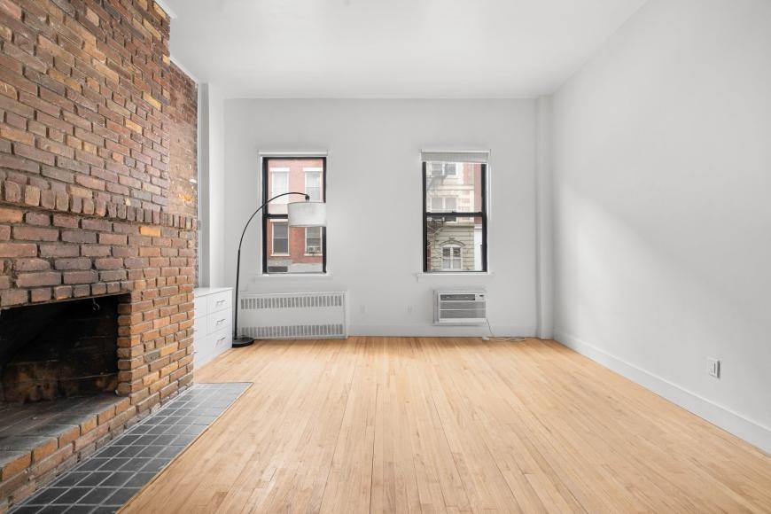 341 W 19th St - Photo 2 of 6