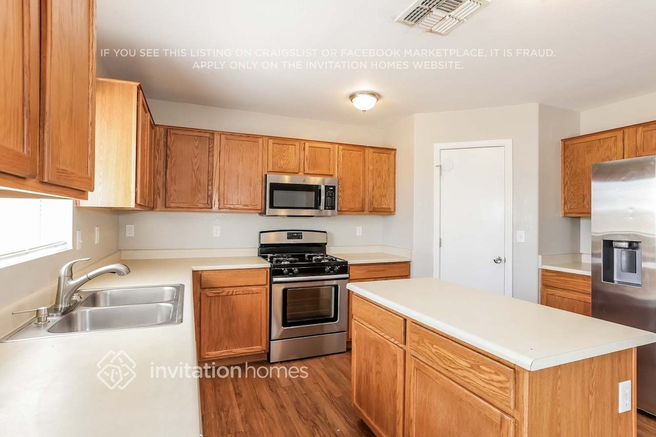 12417 N 127th Dr - Photo 5 of 16