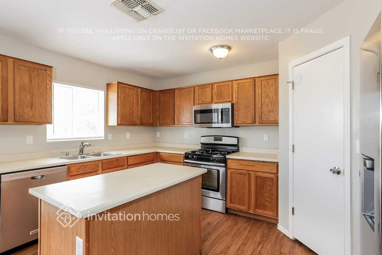 12417 N 127th Dr - Photo 6 of 16