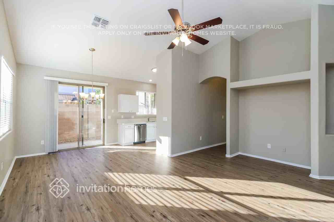 8943 E Calypso Ave - Photo 4 of 16