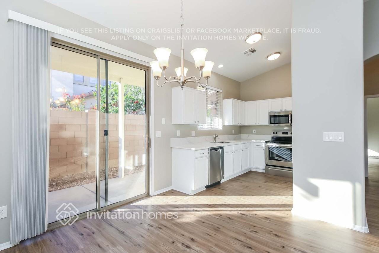 8943 E Calypso Ave - Photo 5 of 16