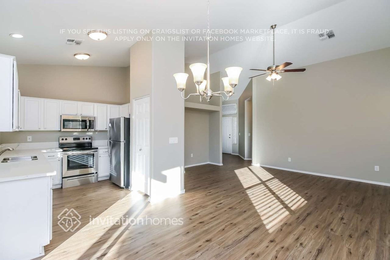 8943 E Calypso Ave - Photo 6 of 16