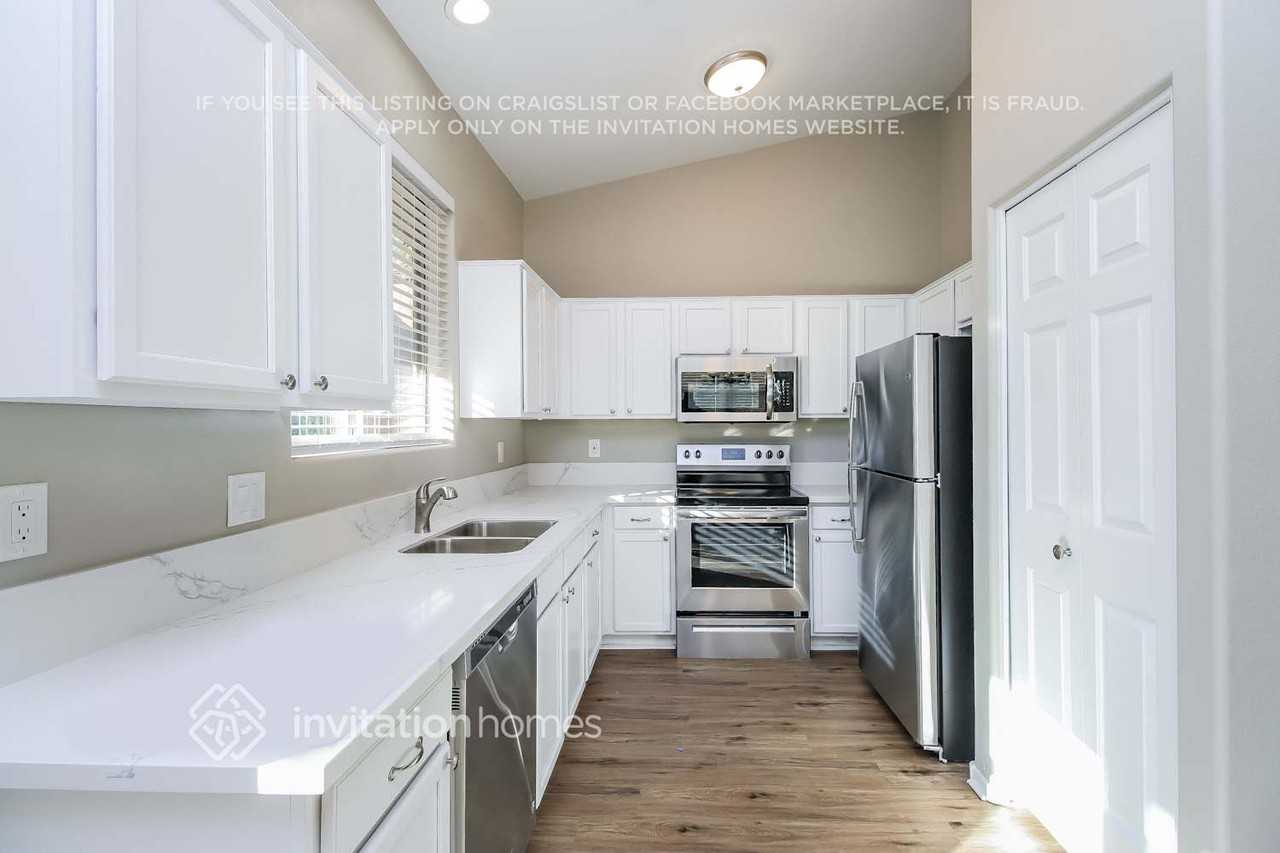 8943 E Calypso Ave - Photo 7 of 16