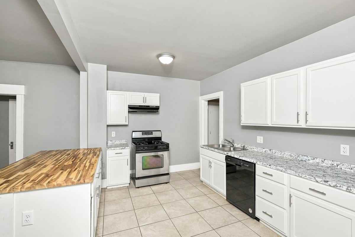 1236 N Boston Ave - Photo 3 of 16