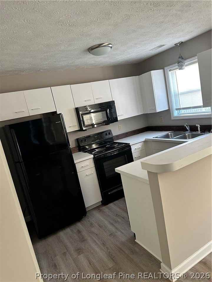 1001 Brookhollow Dr #1 - Photo 3 of 18