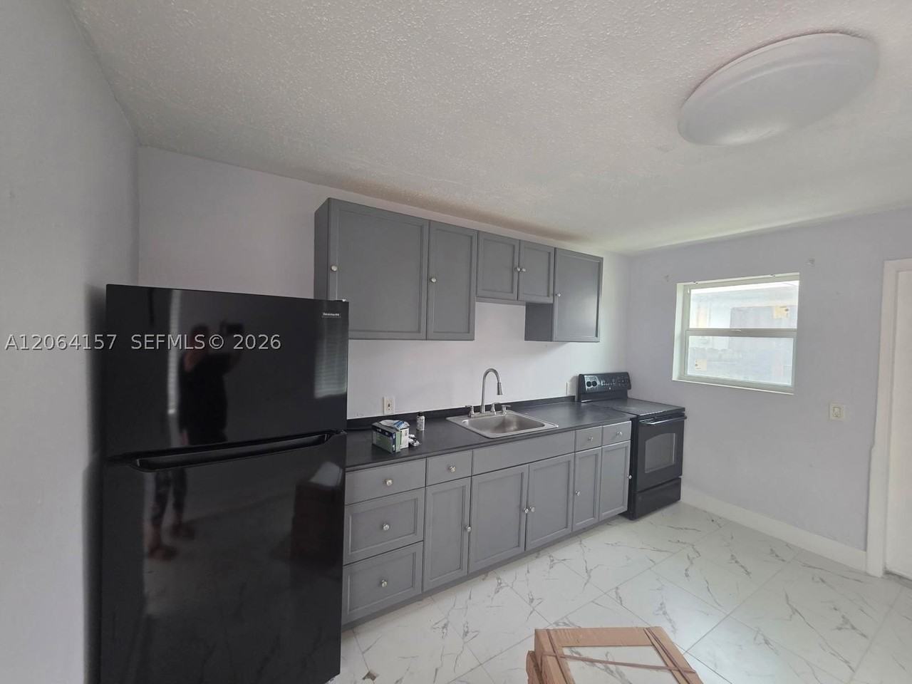 3177 Nw 29th St #A - Photo 3 of 13