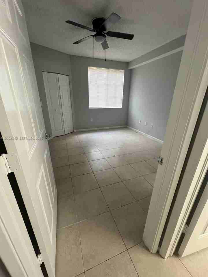 8020 North Nob Hill Road #102 - Photo 2 of 5
