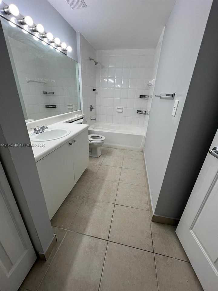 8020 North Nob Hill Road #102 - Photo 3 of 5
