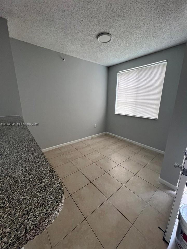 8020 North Nob Hill Road #102 - Photo 5 of 5
