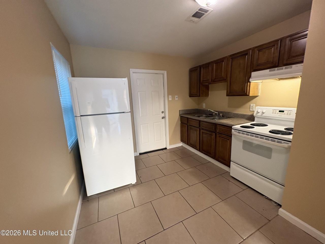 6525 Jasmine St Apt 4 - Photo 5 of 15