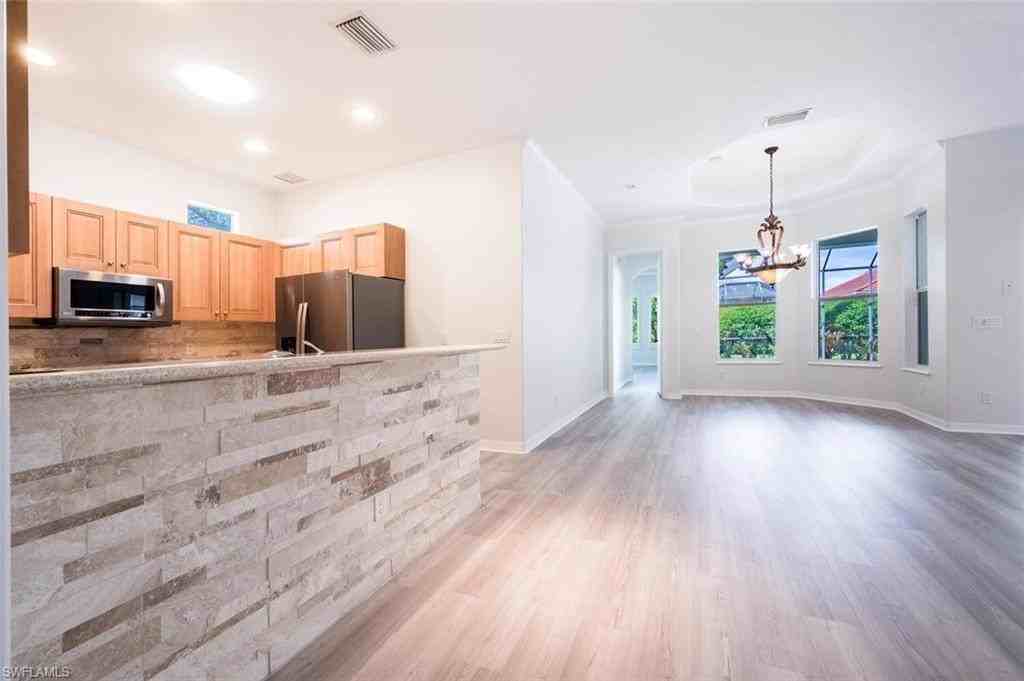 10800 Fieldfair Dr - Photo 4 of 26