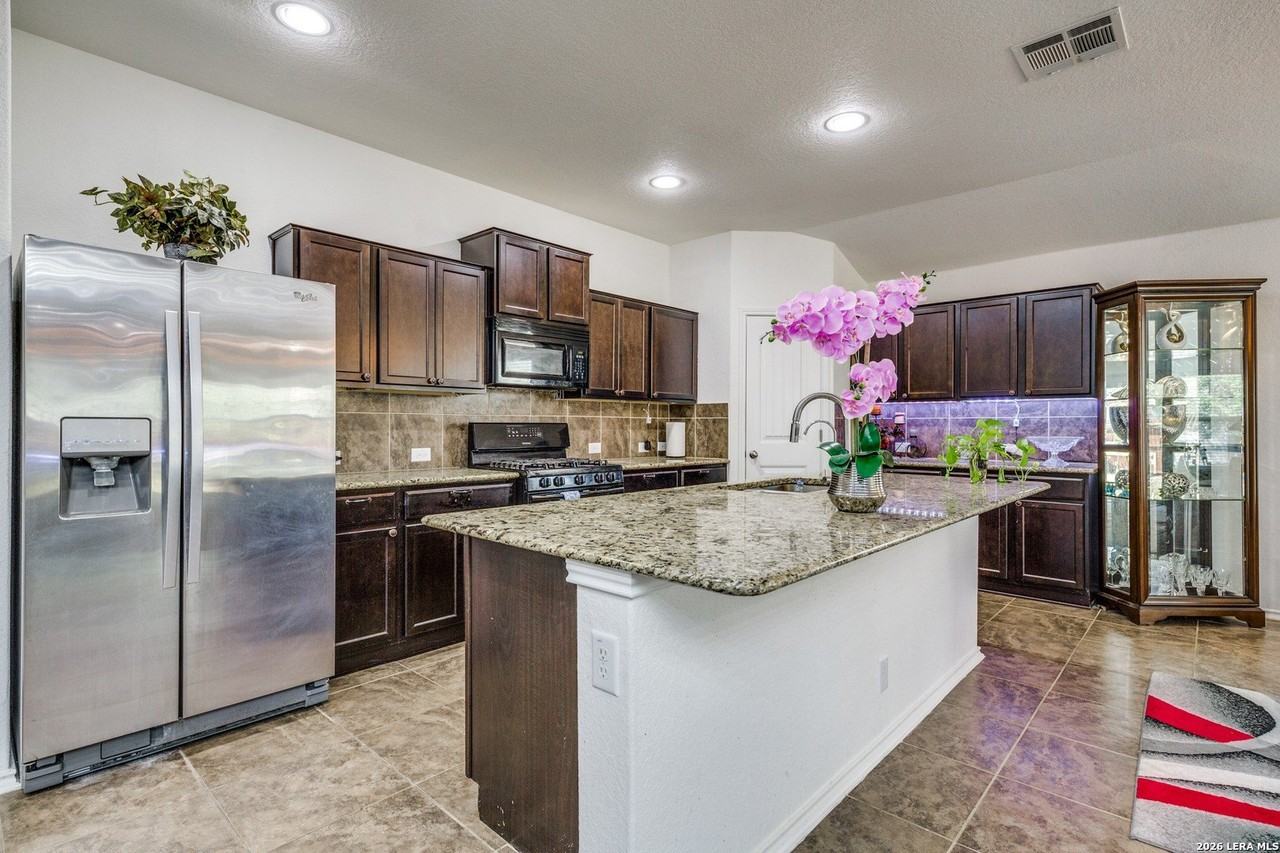 10415 Rhyder Rdg - Photo 3 of 25
