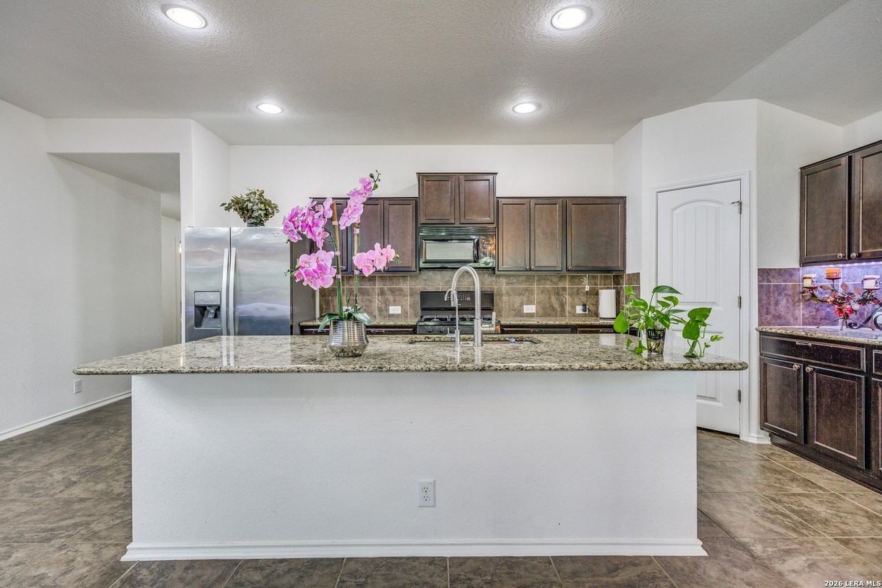 10415 Rhyder Rdg - Photo 4 of 25