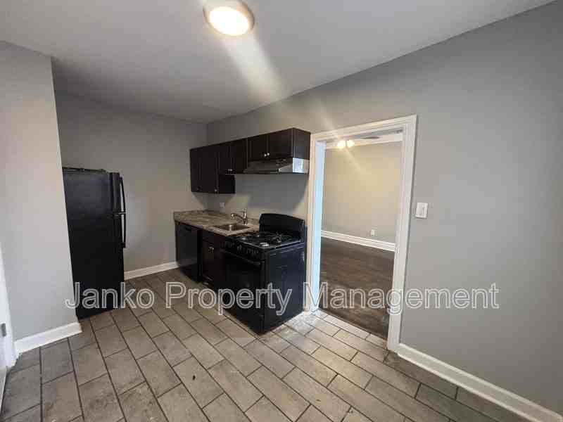 6055 S Troy St #2