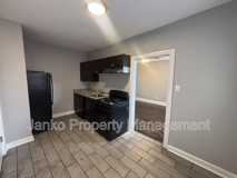 6055 S Troy St #2 - Photo 1 of 1