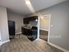 6055 S Troy St #2 - Photo 1 of 1