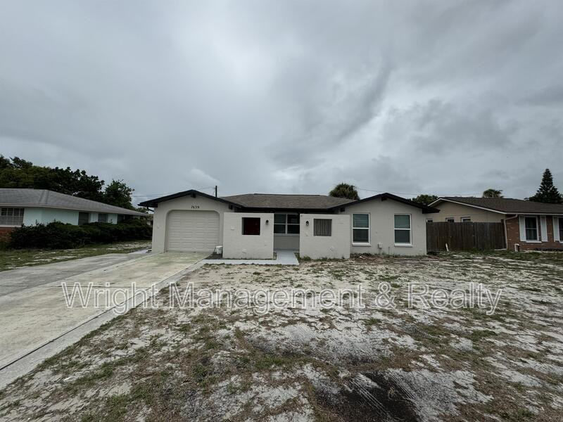 7639 Jasmine Blvd - Photo 2 of 24