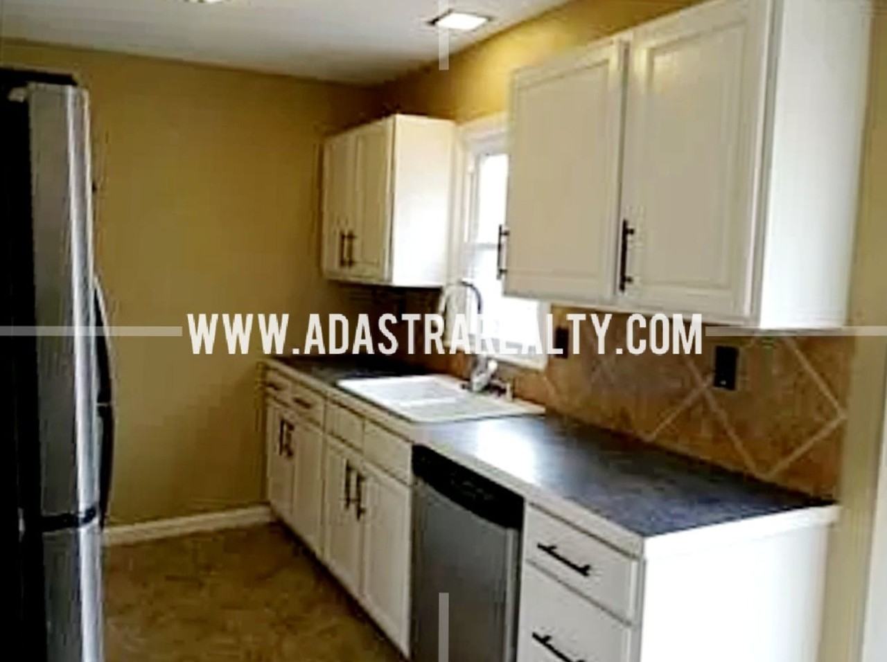 3305 E 107th Ter - Photo 4 of 12