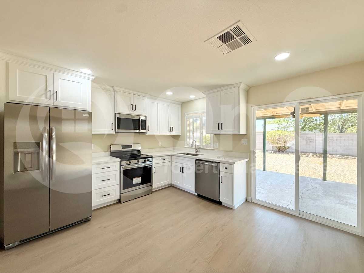 2465 E John Cabot Rd - Photo 3 of 16