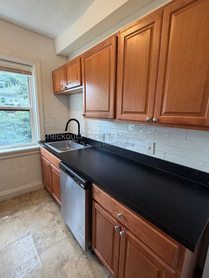 7338 Forsyth Blvd #206 - Photo 3 of 13