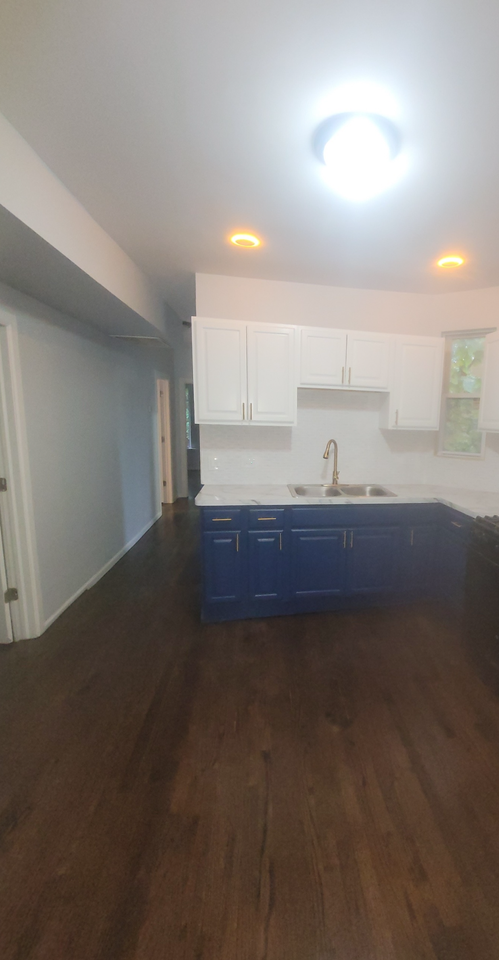 7123 S Rhodes Ave #1 - Photo 6 of 8
