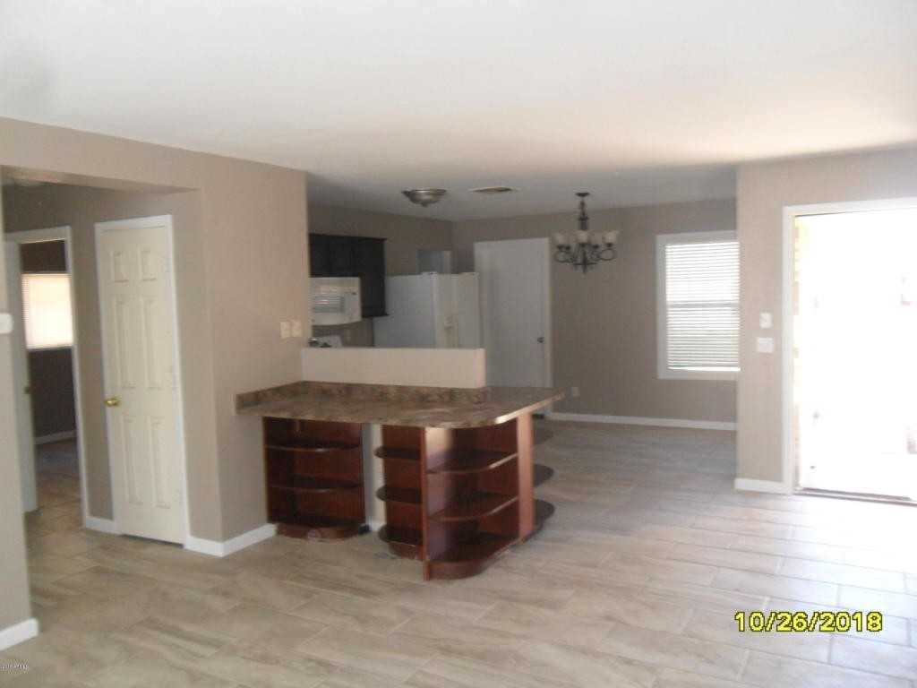 11509 W Charter Oak Rd - Photo 3 of 7