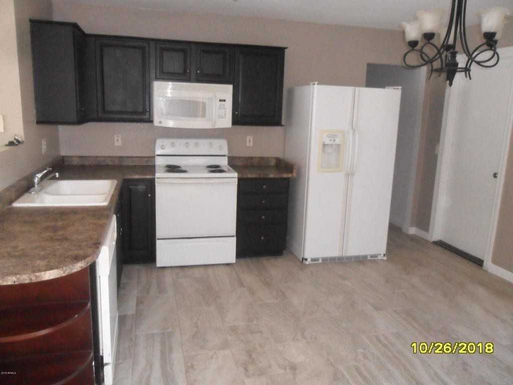11509 W Charter Oak Rd - Photo 4 of 7