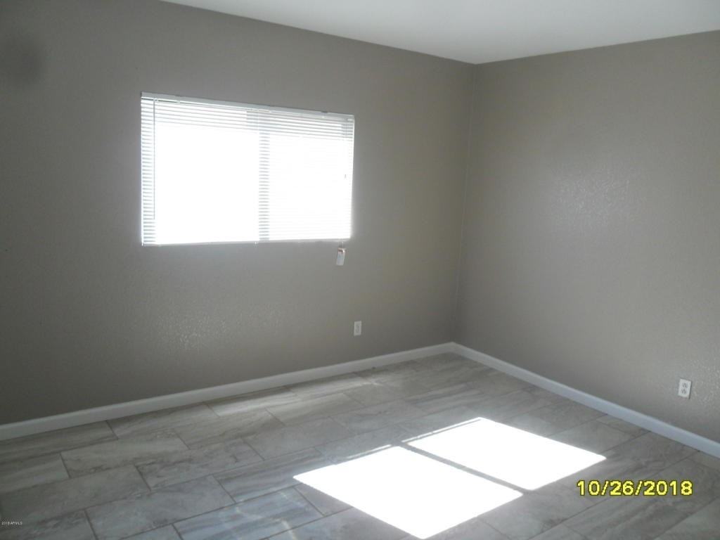 11509 W Charter Oak Rd - Photo 5 of 7
