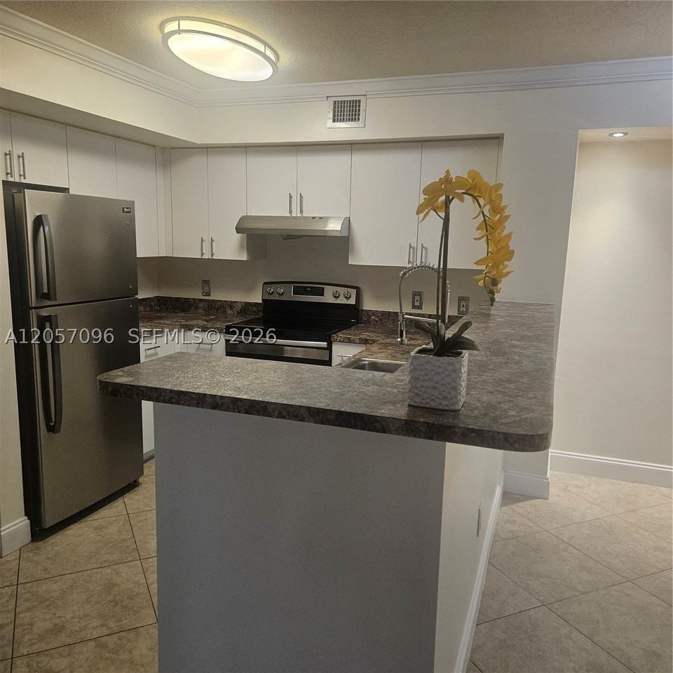 12124 Saint Andrews Pl #107 - Photo 4 of 7