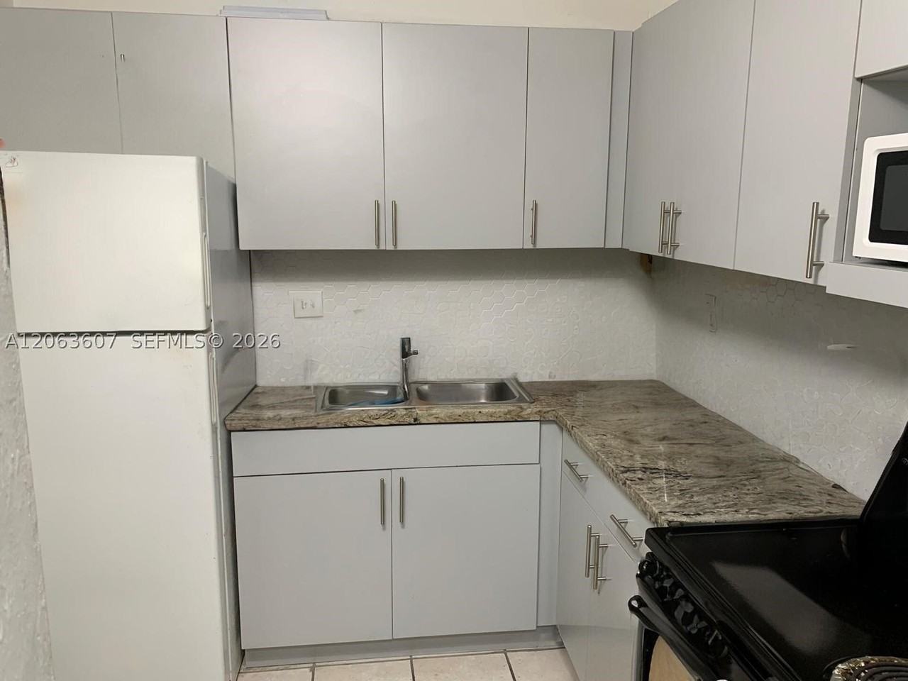 9437 Sw 76th St #V38 - Photo 2 of 5