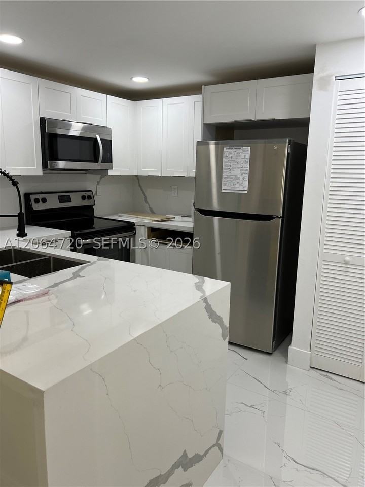 9990 Nw 9th Street Cir #102 - Photo 6 of 32