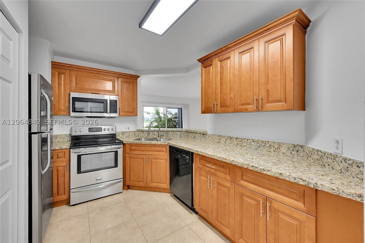 3453 Nw 44th St #107 - Photo 3 of 28