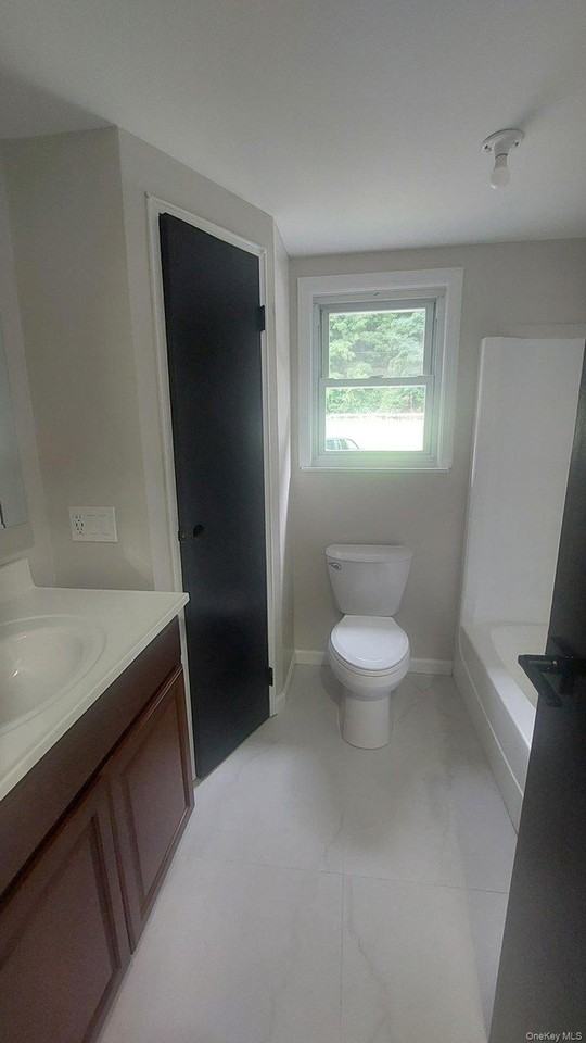 201 Ludingtonville Rd #1A - Photo 4 of 4